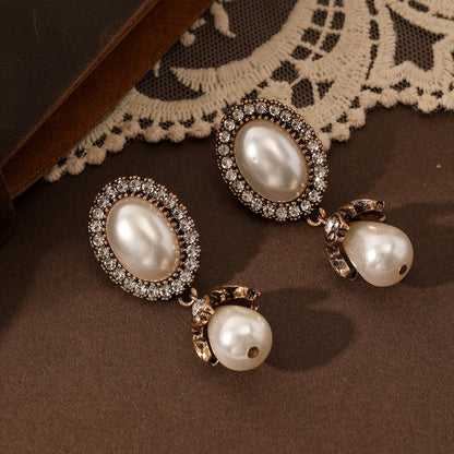 Boucles d'oreilles pendantes vintage en perles encadrées
