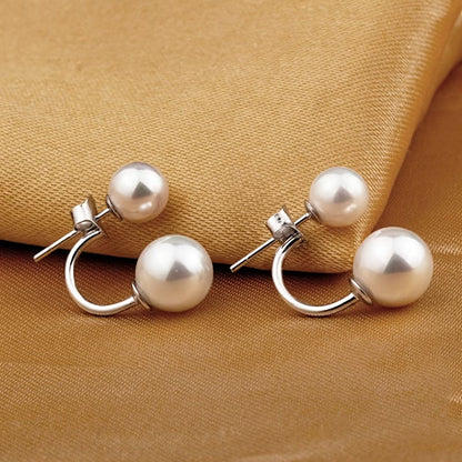 Boucles d'oreilles statement à double perle