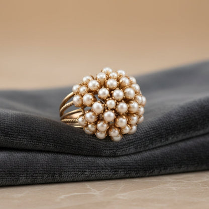 Bague en or avec perle incrustée