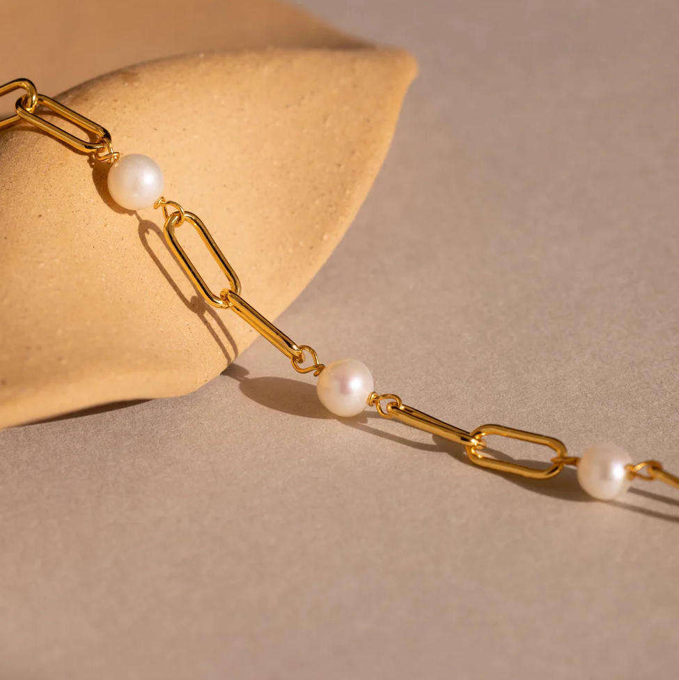 Bracelet en perles et chaîne raffiné