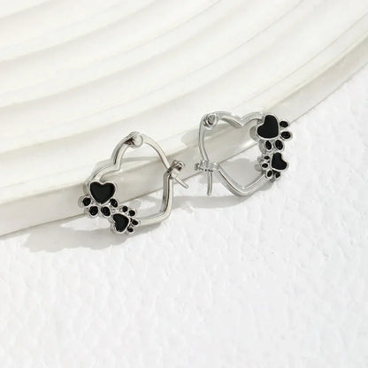 Boucles D'oreilles Avec Cœur et Émail Noir.