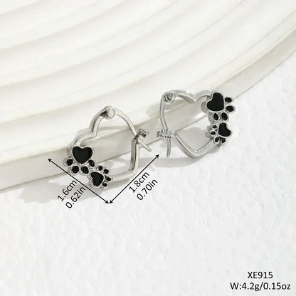 Boucles D'oreilles Avec Cœur et Émail Noir.