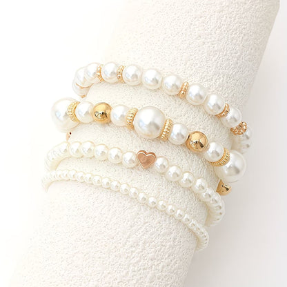 Lot de 4 bracelets en perles superposées