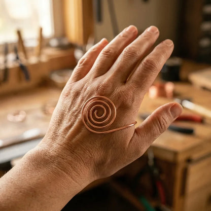 Espiral de mano de cobre Flujo