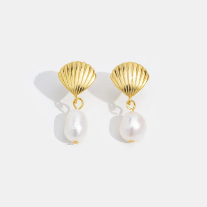 Boucles d'oreilles en or avec coquillage et perles