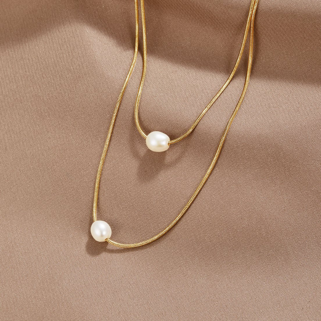 Collier en perles superposées raffiné