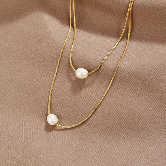 Collier en perles superposées raffiné