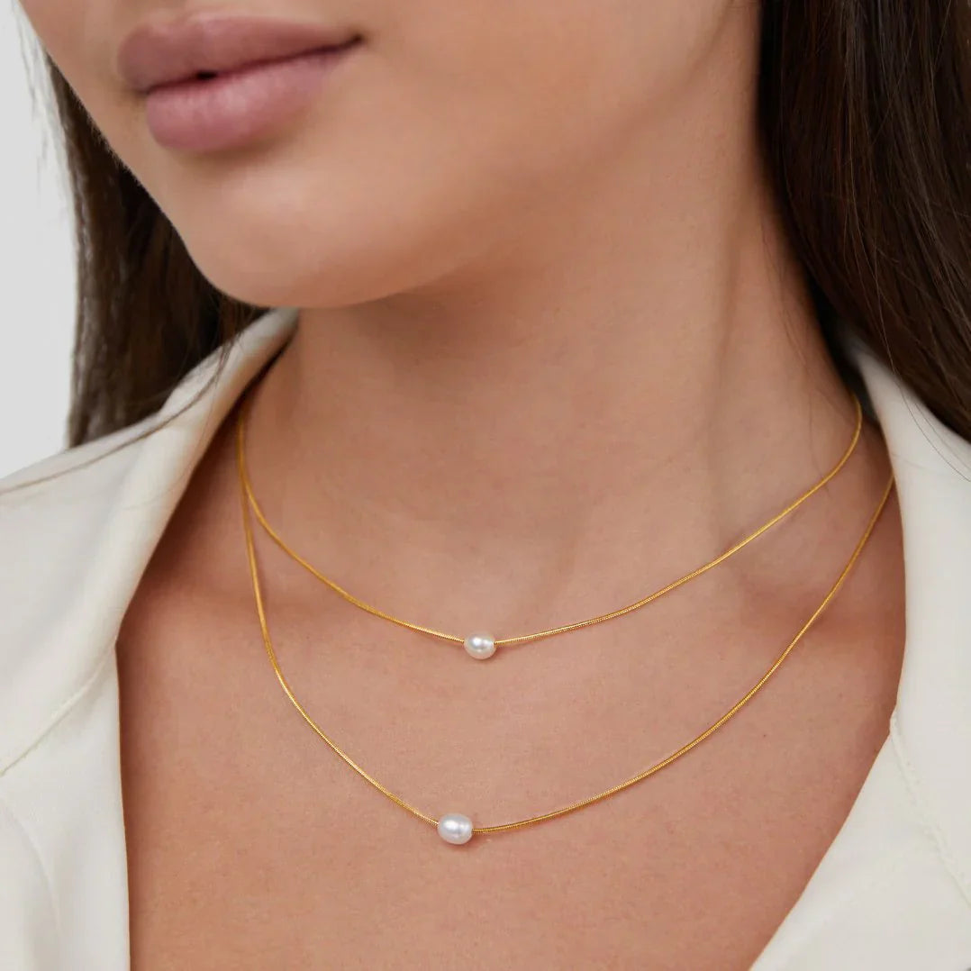 Collier en perles superposées raffiné
