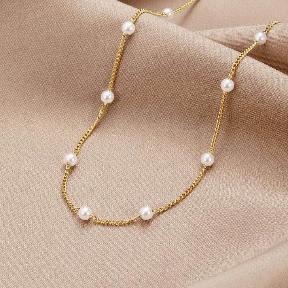 Collier intemporel en or et perles