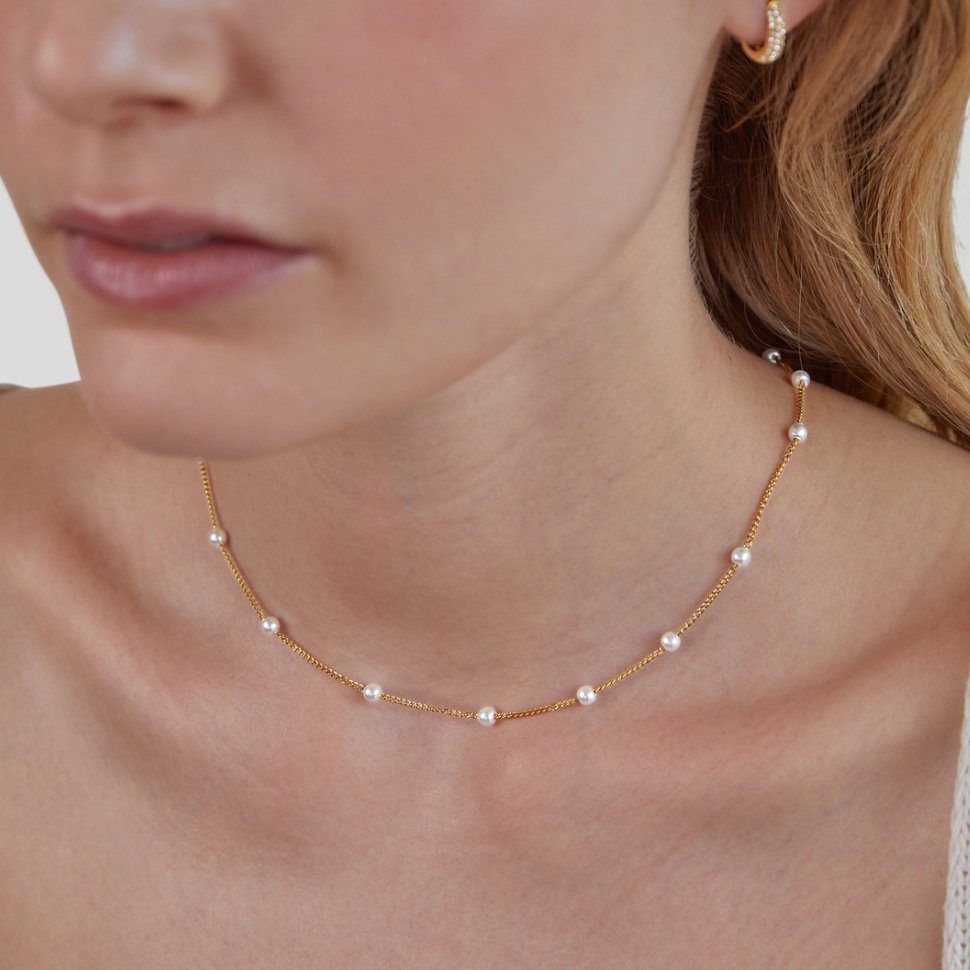 Collier intemporel en or et perles