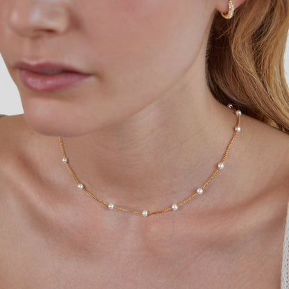 Collier intemporel en or et perles
